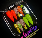 Colorful nail art designs in a clear case with 'Angel' branding.