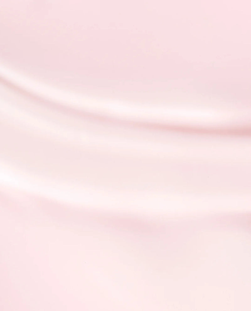Gradient of pink shades on a light pink background